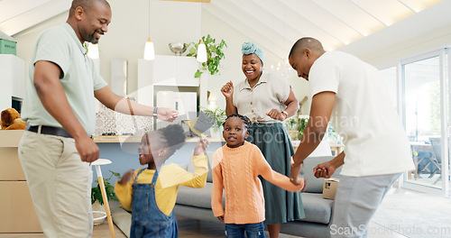 Image of Moving, boxes and parents with kids dancing in living room of new house, happiness and investing in home. African mother, father and children with cardboard box, real estate and happy black family.