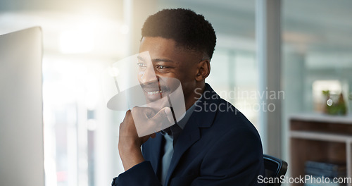 Image of Businessman, thinking and reading on computer with a smile in office for email, feedback or communication. Working, online or black man with research, inspiration or ideas from Nigeria report or news