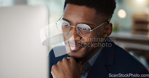 Image of Happy, businessman and reading email on computer in office with a smile for feedback or online communication. Black man, thinking or happiness for working with research, inspiration or ideas in Kenya