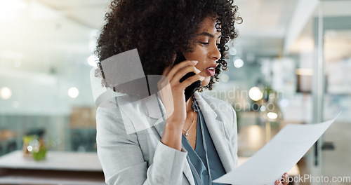 Image of Phone call, documents and a happy business black woman in the office for communication or negotiation. Smile, contact and discussion with a young female employee talking on her mobile for networking