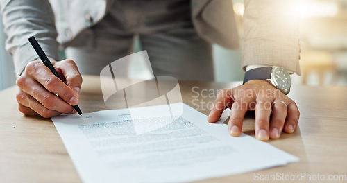 Image of Closeup, hands and business man with documents, writing and signature with planning, review and feedback. Zoom, person and employee with paperwork, lawyer or legal contract with letter, policy or pen