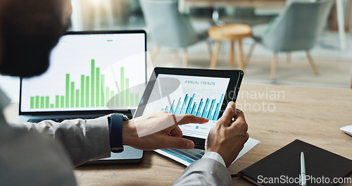 Image of Hands, laptop and chart with tablet for business man, analysis or check progress of economy, investment or profit. Financial agent, pc and reading graph for data on fintech app, growth and numbers