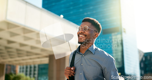 Image of Business, happy and walking black man on city journey, commute trip and realtor smile on way to office building. Happiness, career expert and African real estate agent on morning travel in Nigeria