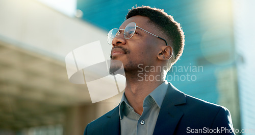 Image of Black man in business, thinking about future ideas and corporate employee outdoor, dream and inspiration. Insight, decision and brainstorming with goals, mind with travel or commute to work in city