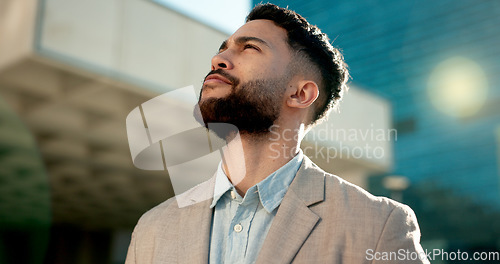 Image of Man in business, thinking about future ideas or search for building outdoor with dream and inspiration. Insight, decision and brainstorming with goals, location with travel or commute to work in city