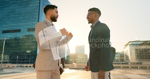 Image of Men, colleagues and talking outside in corporate clothes, advice or career growth tips. Planning, teamwork and city buildings on commute, discussion and businessmen for collaboration, project or goal