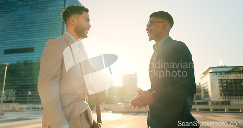 Image of Men, colleagues and talking outside in corporate clothes, advice or career growth tips. Planning, teamwork and city buildings on commute, discussion and businessmen for collaboration, project or goal