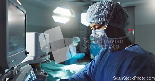 Image of Hospital, doctor and patient monitor for surgery, operating room and setting machine. Operation, medical or diagnosis for high blood pressure, vital signs and data change in anesthesia, type or check