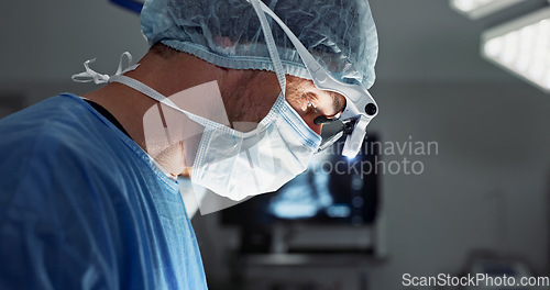 Image of Surgery, hospital and doctor with face mask for operation, medical emergency and service in theater. Healthcare, procedure and closeup of surgeon with light for patient injury, wellness and accident