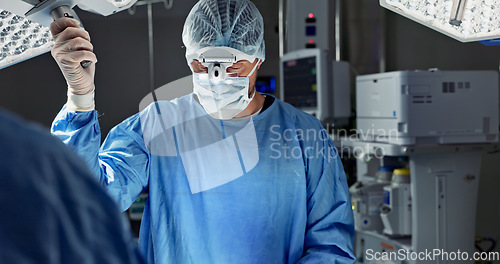 Image of Doctors, team and surgery in theater with medical support for healthcare, safety and operation room at hospital. Surgeon, medicine and teamwork or collaboration with tools for cardiology or emergency