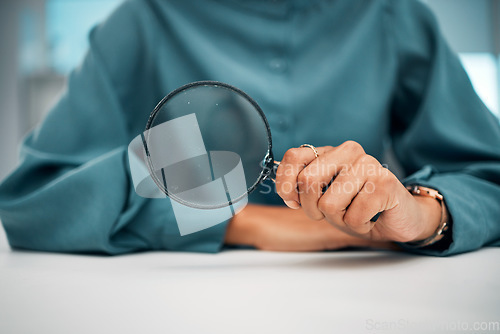 Image of Magnifying glass, investigation and person hand with detective, study and business employee. Lens, crime search and evidence scan with spy magnifier, solution and analysis for knowledge in office