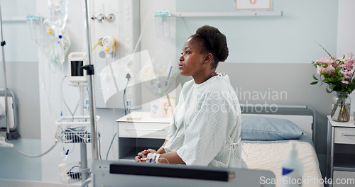 Image of Patient, hospital and thinking on bed with depression, sad and pulmonary disease diagnosis with sadness. Black woman, treatment and recovery in medical center, chest pain and emergency healthcare