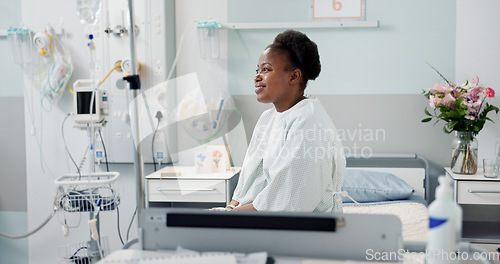 Image of Patient, hospital and happy on bed with recovery, illness and accept diagnosis with treatment plan. Black woman, healthcare and wellness in medical center, bedroom and smiling for doctor and therapy