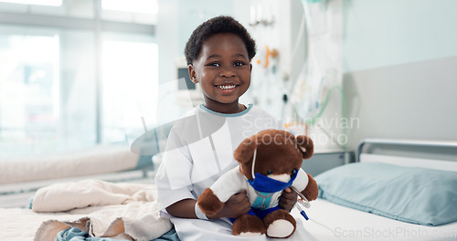 Image of Healthcare, black child and teddy bear in hospital for surgery recovery, patient and healthy results. Face, boy kid and bed for medical, wellness or toy for relax on bed, rehabilitation and happiness