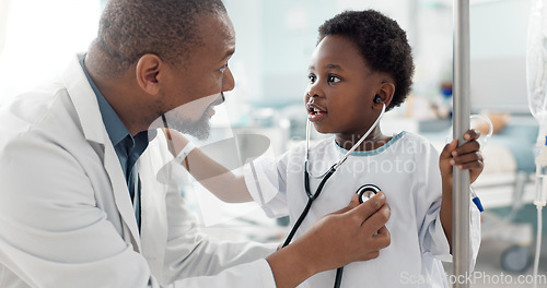 Image of Doctor, patient and child with stethoscope, hospital and check up for health, breathing and illness. Smile, playing and pediatrician for wellness, medical and asthma for heart, healthcare or medicine