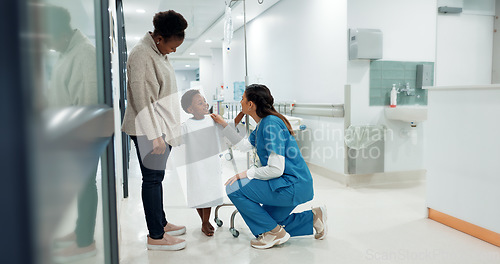 Image of Black family, healthcare and a pediatrician talking to a patient in the hospital for medical child care. Kids, trust or medicine and a nurse consulting a boy with his mother in the clinic for health