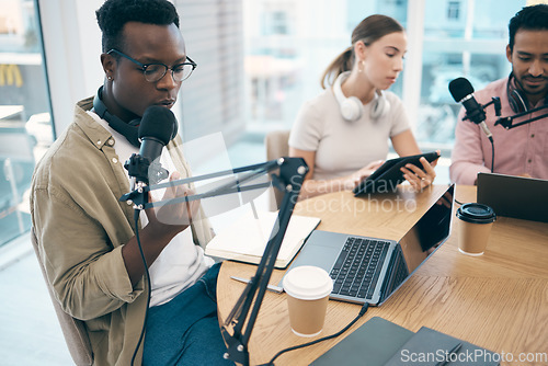 Image of Man, microphone and podcast or recording, streaming or creative conversation. Diversity, group and black male person or laptop in office for social network, influencer or live online content creating