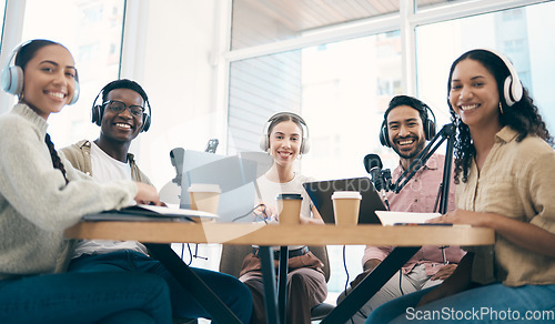 Image of Men, woman and group with microphone, podcast or portrait for chat, creativity or opinion on live stream. Team, laptop and headphones for web talk show, broadcast or smile for collaboration at desk