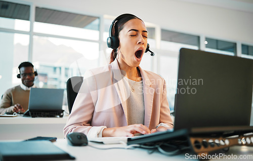 Image of Call center, burnout and tired business woman yawn in office consulting for crm, contact us or customer service. Telemarketing, fatigue or exhausted lady consultant sleepy, low energy or bored by faq