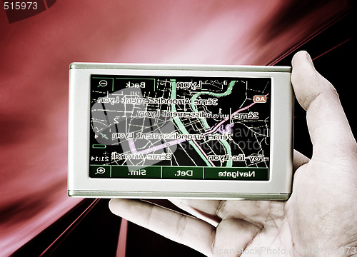 Image of GPS Vehicle navigation system in a man hand.