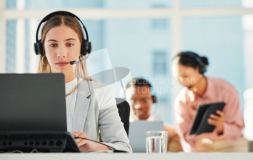 Image of Call center, woman and agent at laptop for telemarketing, customer service or IT support in coworking agency. Sales consultant at computer for telecom questions, FAQ advisory and CRM contact at desk