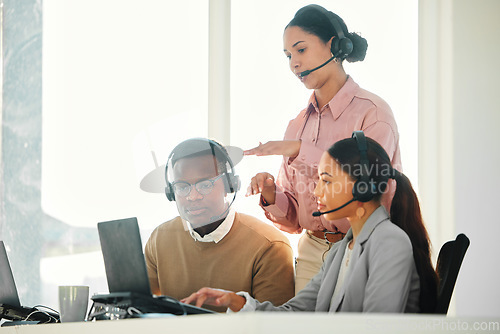 Image of Call center, team training and people on computer for technical support, system management and online advice. Business mentor, consultant and manager talking, support and helping on laptop in office