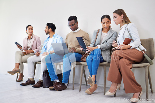 Image of Creative people, technology and waiting room at office in row, networking or sitting for recruiting at office. Group of employees or team startup in line for hiring, teamwork or meeting at workplace