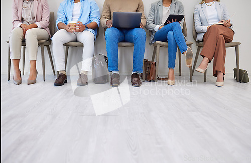 Image of Legs, business people and technology in waiting room for internet, networking and cv application in a row. Men, women and group feet together for interview, recruitment or we are hiring at company