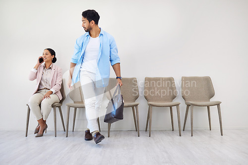 Image of People, waiting room and businessman walking to interview at job recruitment agency together. Human resources, hiring and diversity, man and woman in office lobby with professional career opportunity