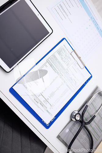 Image of Tablet, hospital documents and tablet for background, healthcare service and medical results or pathology report. Paperwork, consultation and empty clinic with digital, stethoscope or patient charts