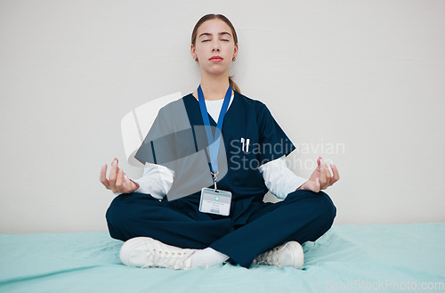 Image of Woman, nurse and meditate to relax in hospital, healing and break from work, yoga and calm for mental health. Medical professional, peace and wellness for aura, zen and chakra for balance in career