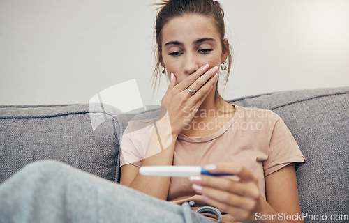 Image of Pregnancy test, surprise and woman on sofa in home, reading bad news and check negative results. Pregnant, stick and sad mother in living room shocked for maternity, stress and anxiety for fertility