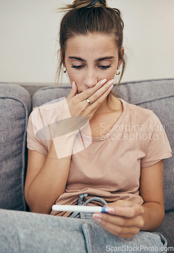 Image of Pregnancy test, shock and sad woman on sofa in home, reading bad news and check negative exam results. Stick, surprise and pregnant mother depressed in living room for maternity, stress and anxiety