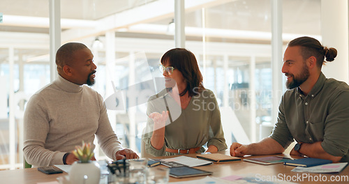 Image of Meeting, conversation and business people in the office for working on a creative project in collaboration. Teamwork, diversity and group of designers in discussion for planning in modern workplace.