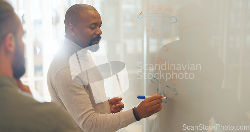 Image of Business people, presentation or black man writing on board for coaching, learning or mentorship advice. Marketing training, manager or leader teaching ideas for strategy, mission or team planning