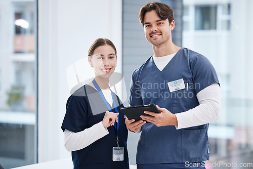 Image of Portrait of doctors, man and woman with tablet in hospital with smile, healthcare and teamwork. Happy medical professional, nurse and surgeon with digital app for research, health insurance and pride