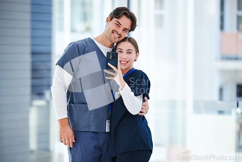 Image of Doctors hug, friends selfie or happy people, nurses or surgeon smile for medical services, help or clinic photography. Embrace, healthcare collaboration or medic post memory photo to social network