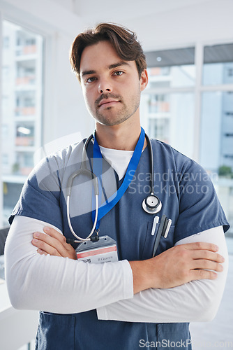 Image of Hospital portrait, arms crossed and serious man, doctor or nurse with confidence, pride and medical expertise. Healthcare, medicine clinic trust and professional medic for cardiology support help