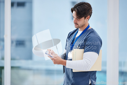 Image of Hospital clipboard, doctor or man writing prescription, healthcare advice or clinic information. Wellness services, medical checklist or medicine expert, surgeon or nurse with list, notes or schedule