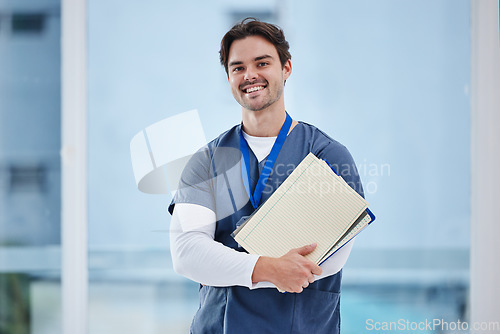 Image of Doctor, arms crossed and portrait of happy man with notebook, healthcare records or clinic info for study test. Surgeon internship, medical education and student nurse confident for medicine research