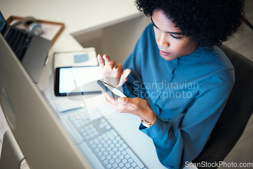 Image of Phone, business woman and night with mobile networking and working in an office. Email, reading and web analysis of a female professional at a company with web design deadline for work website