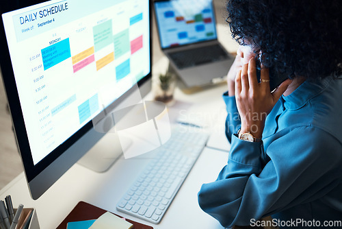 Image of Woman with computer, phone call and schedule in office for agenda, reminder and office administration. Online calendar, diary and cellphone, girl at desk planning spreadsheet for time management.