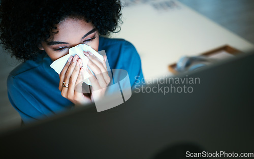 Image of Business, night and woman with a sneeze, sick and illness with burnout, stress and overworked. Person, consultant and employee with a computer, virus and disease with tissue, allergies and fatigue