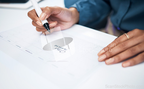 Image of Woman, hands and marker on calendar for tax, deadline or reminder in schedule planning or strategy on desk at office. Closeup of female person writing on paper for agenda, memory or plan at workplace