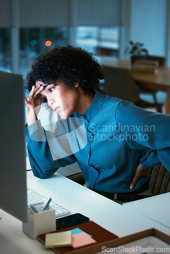 Image of Back pain, night and business woman with headache tired of overtime, deadline and work pressure with burnout and strain. Corporate, evening and employee with stress working late in a company