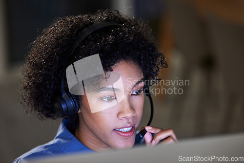 Image of Computer, customer service headset and business woman consulting, talking and reading callcenter report, info or loan advice. Tech support face, night chat and agent telemarketing on web sales pitch