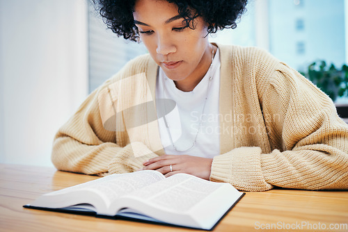 Image of Bible, reading and woman studying religion at desk in home, Christian faith and knowledge of God. Praise, learning and girl at table with holy book, gospel and inspiration for prayer in apartment.