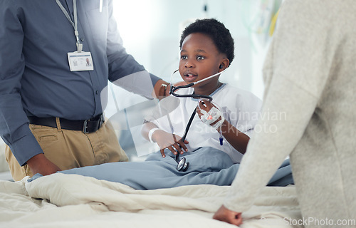 Image of Pediatrician, mother or child with stethoscope to play in hospital for medical exam, game or lungs test. Doctor, monitor or young African boy listening to heart beat with parent or mom for wellness