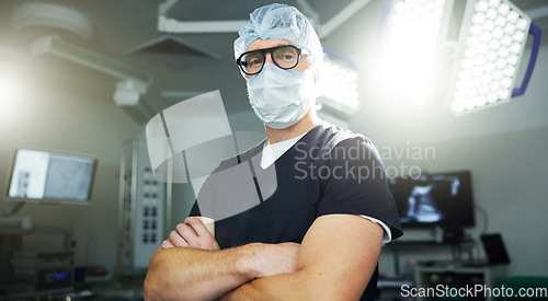 Image of Man, portrait and surgery in operating room confident healthcare, professional or expert help. Male person, face mask or hospital theatre lights or medicine support, doctor or emergency care service