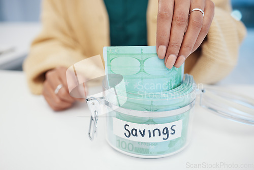 Image of Hands, cash and savings in a jar for future, financial plan and bills closeup, income and wealth. Container, person save money for growth and investment, cashback and finance with goals and profit